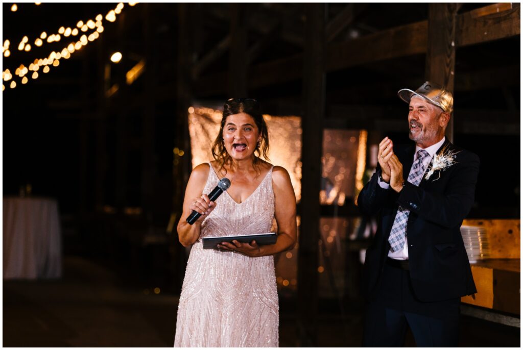 The Mother of the bride delivers a toast during the Ithaca Farmer's Market wedding reception.