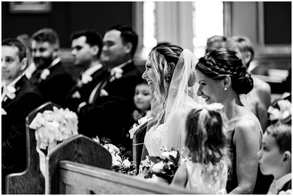A bride laughs during her wedding ceremony in Syracuse, NY