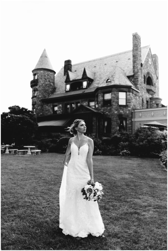 a stunning black and white image of the bride on her wedding day at belhurst castle.