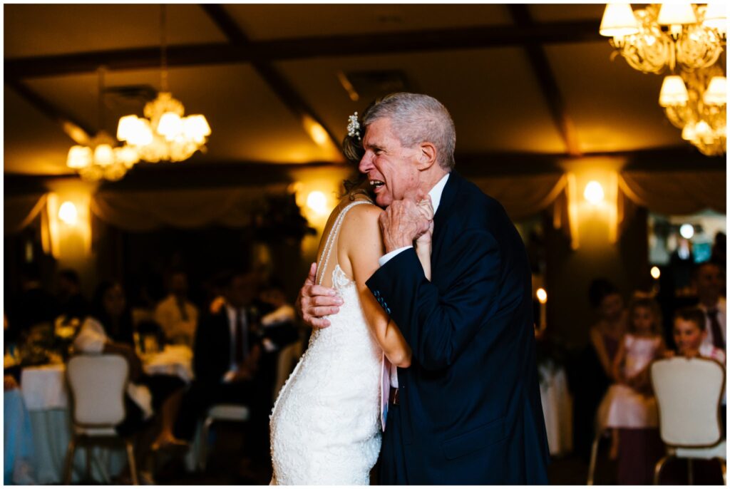 Bride and father share a dance at belhurst castle.
