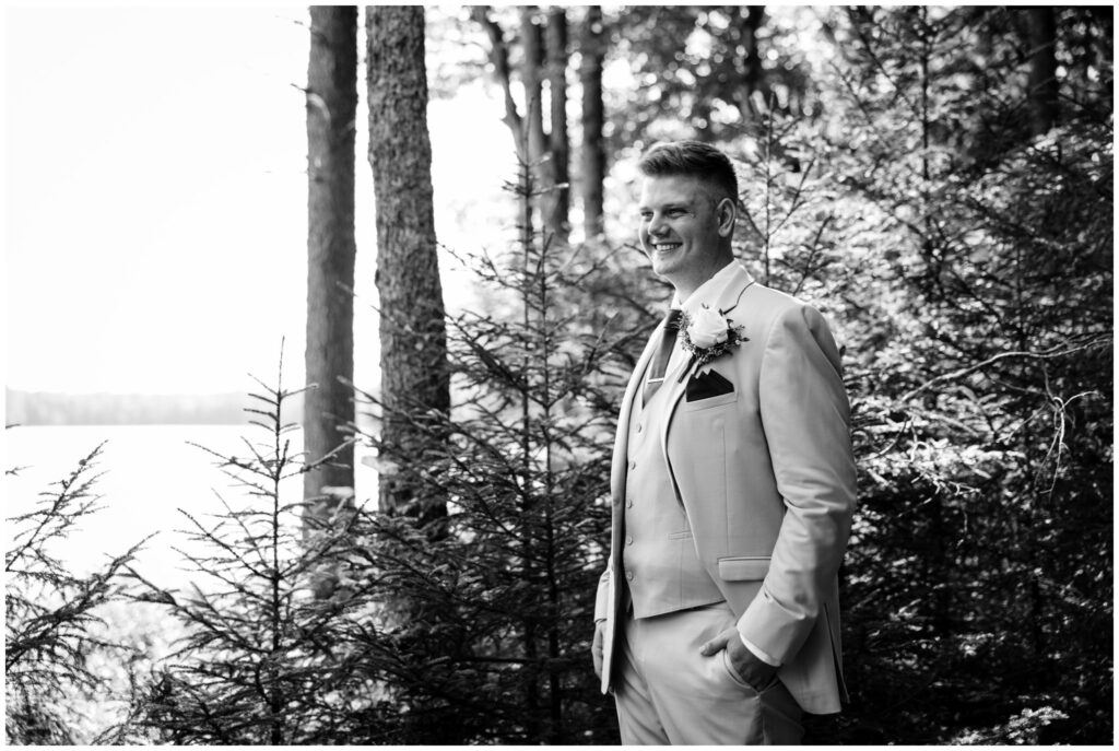 Portrait of a groom in the adirondacks.