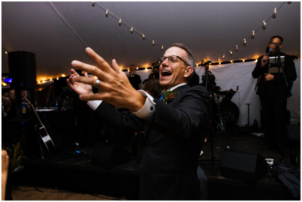 People dance and have fun at the camp gorham wedding in the adirondacks.