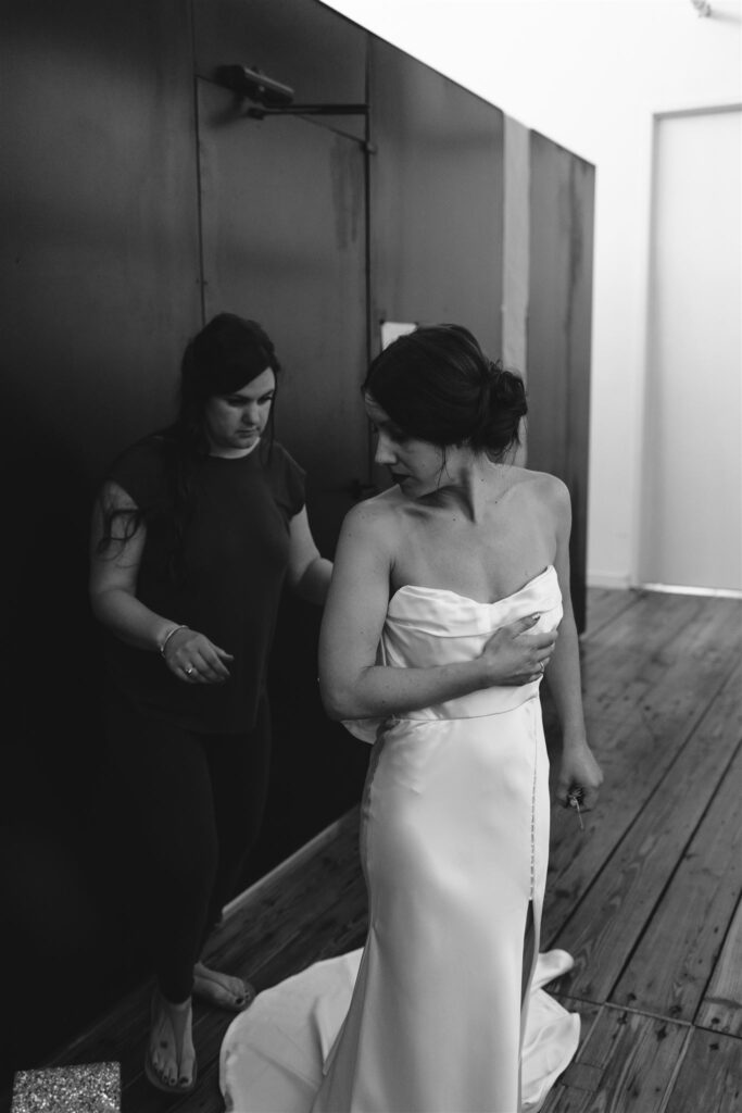 Bride gets ready on her wedding day in the Berkshires at her Greylock Works Wedding.