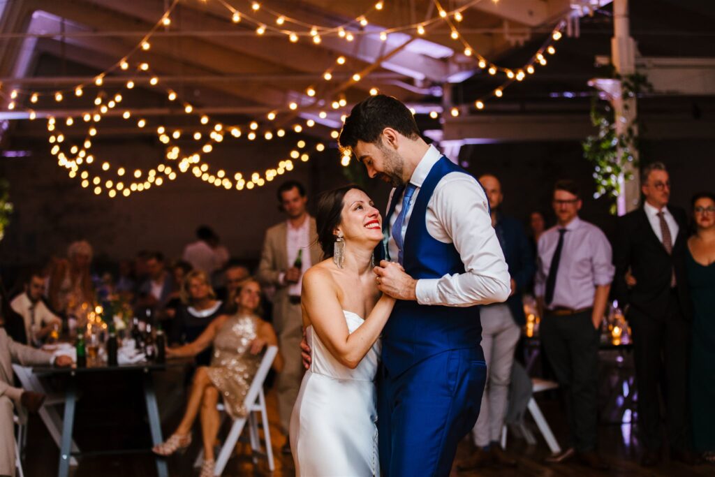 Bride and groom share a first dance at their greylock works wedding.