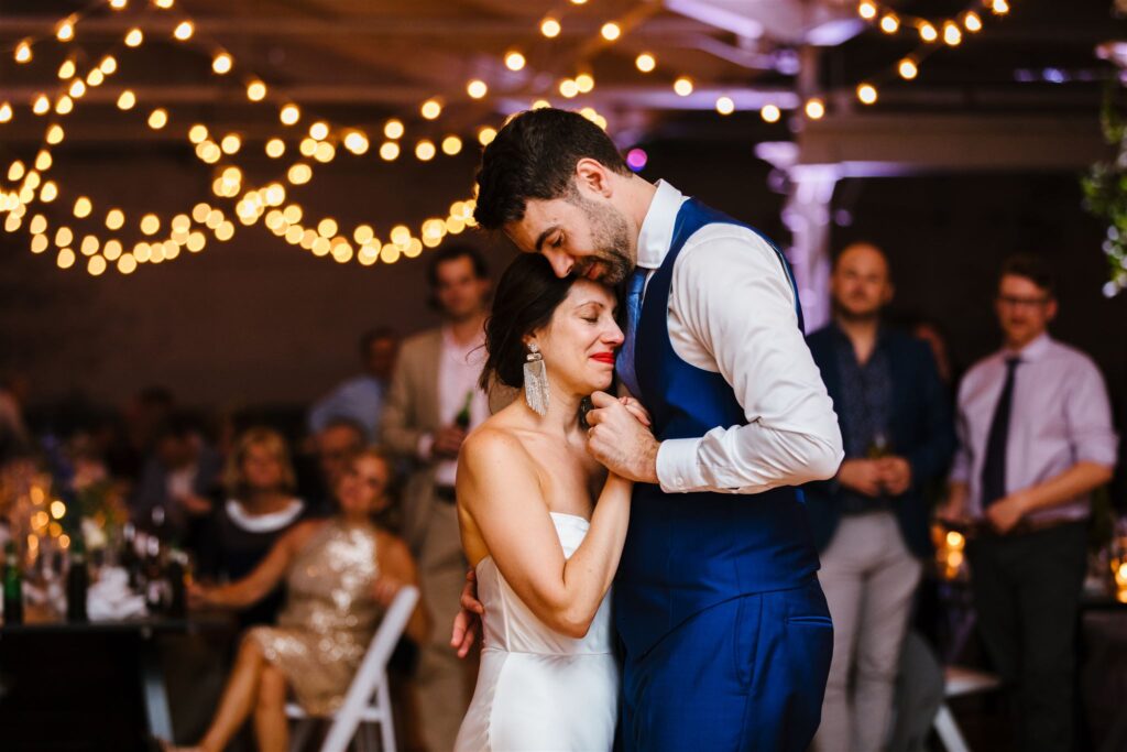 Bride and groom share a first dance at their greylock works wedding.