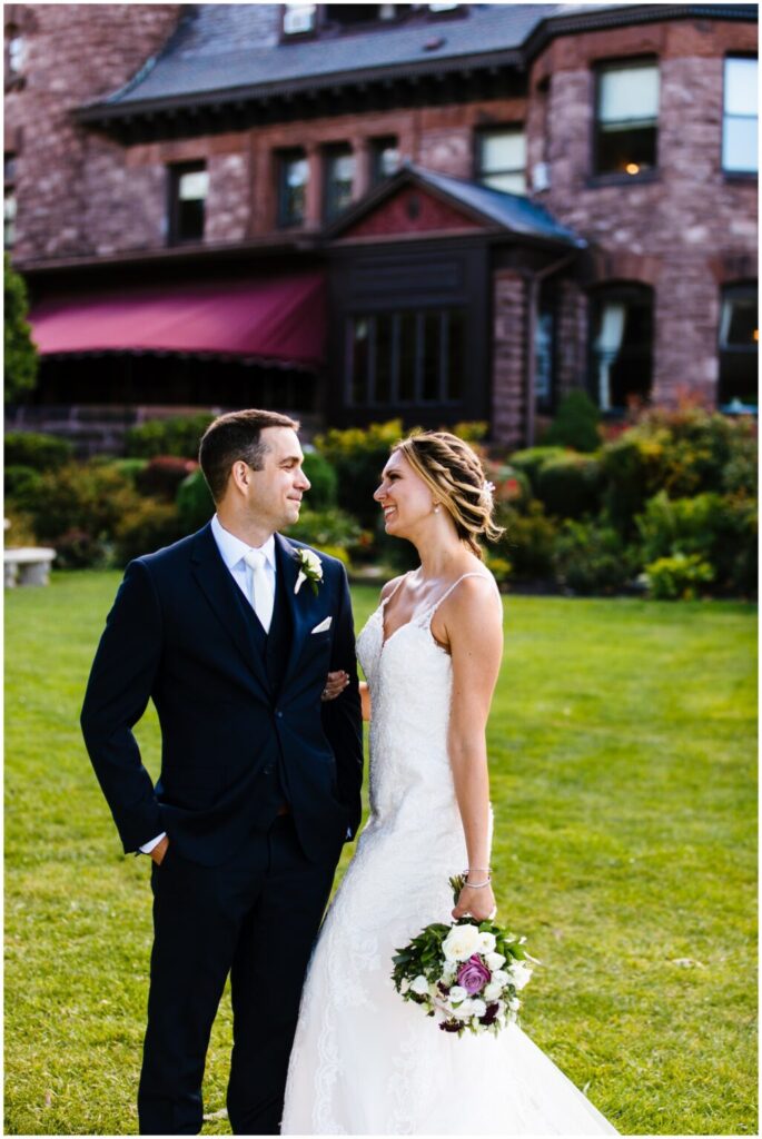 Bride and groom at belhurst castle, one of many finger lakes wedding venues