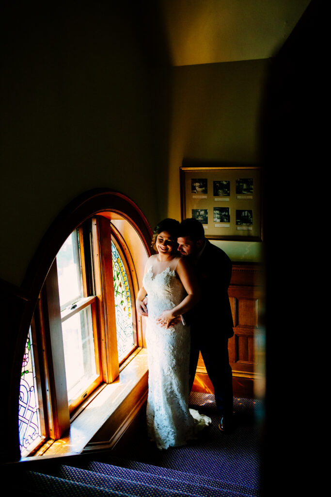 Bride and groom at belhurst castle, one of many finger lakes wedding venues.