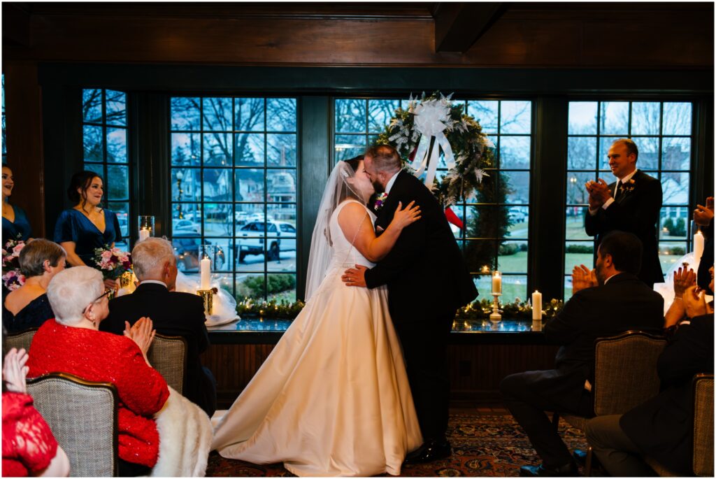Bride and groom during their ceremony at their Skaneateles wedding.