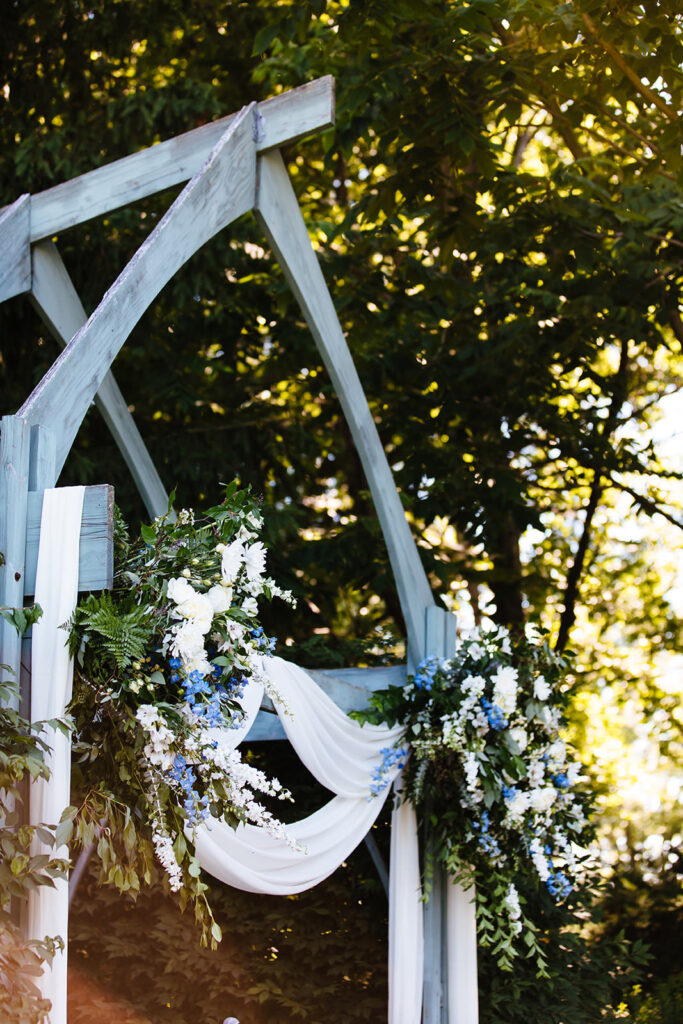 flowers adorn the arbor at the John Joseph Inn in Groton, NY.