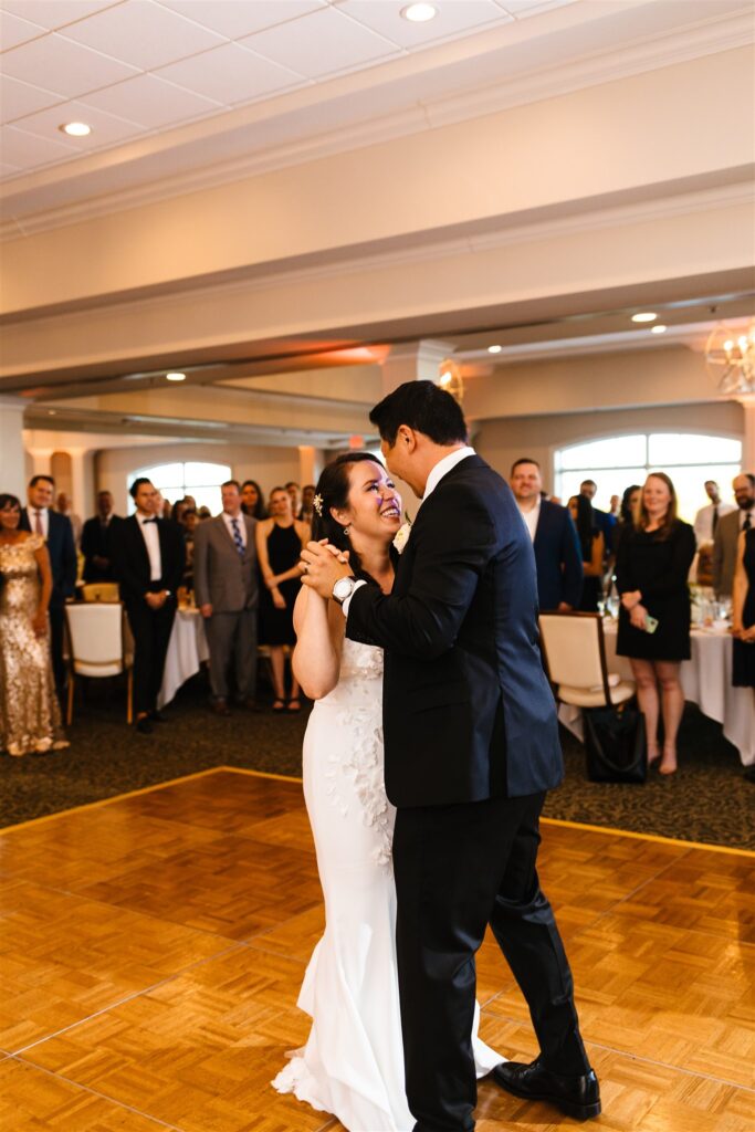 Bride and groom share a first dance at their locust hill country club wedding.