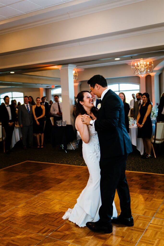 Bride and groom share a first dance at their locust hill country club wedding.